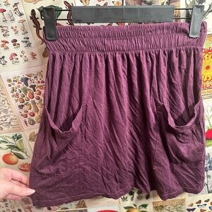 Talula XS plum colour high waist skirt. Has pockets in front. Great condition